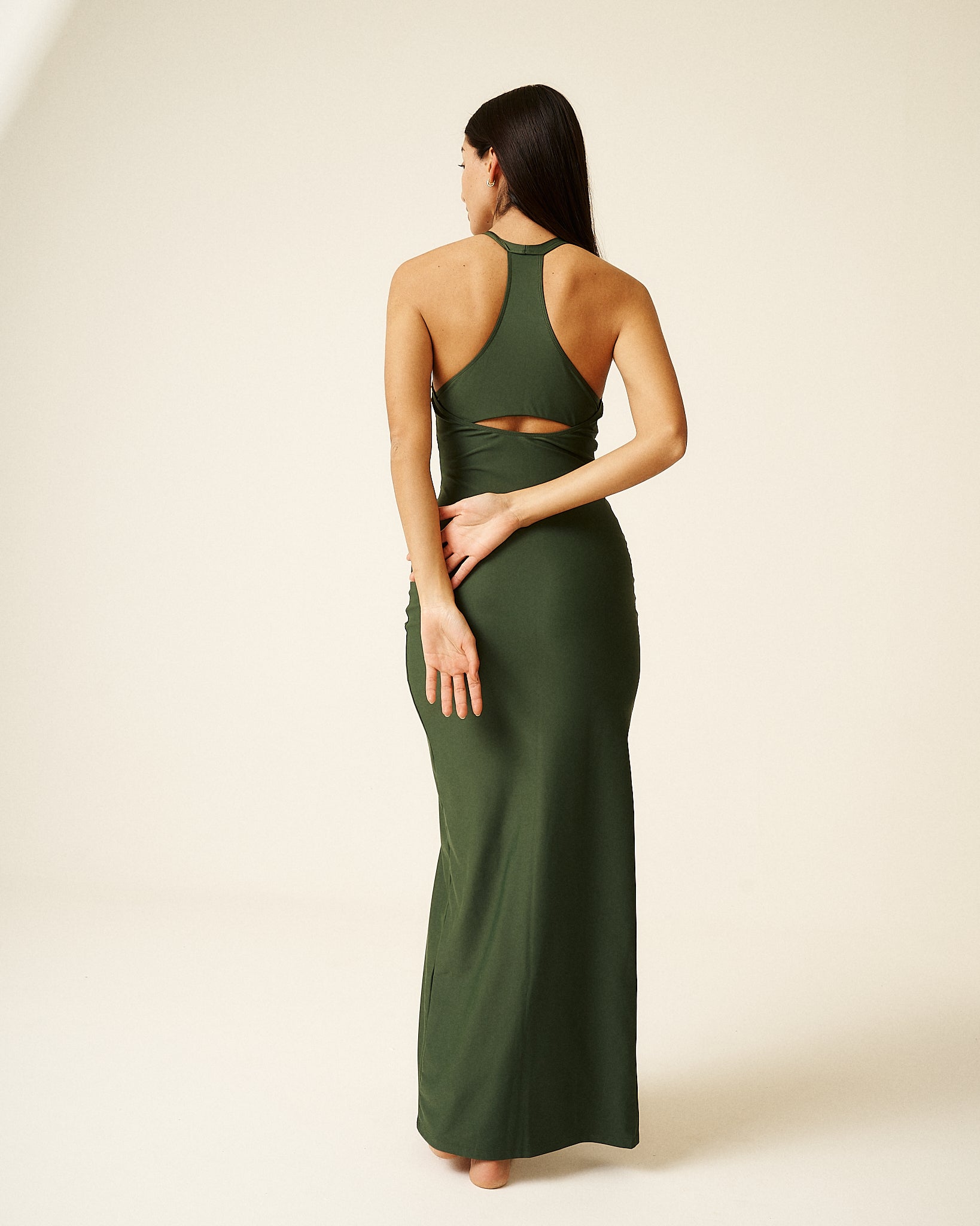 Discover Olivia, our exclusive sustainable luxury dress. Premium Econyl fiber offers elegance, comfort, and performance. Limited to 150 units, each certified and one-of-a-kind. Enjoy UPF50+ skin protection. Elevate fashion with purpose and indulge in our exquisite limited edition dresses. Green